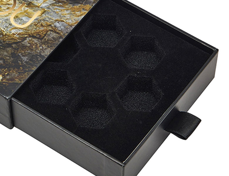 Custom-cut foam insert for rigid box packaging