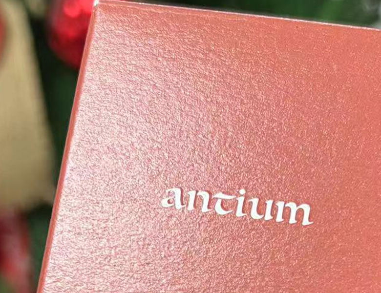 Varnishing finish sample on printed paper packaging